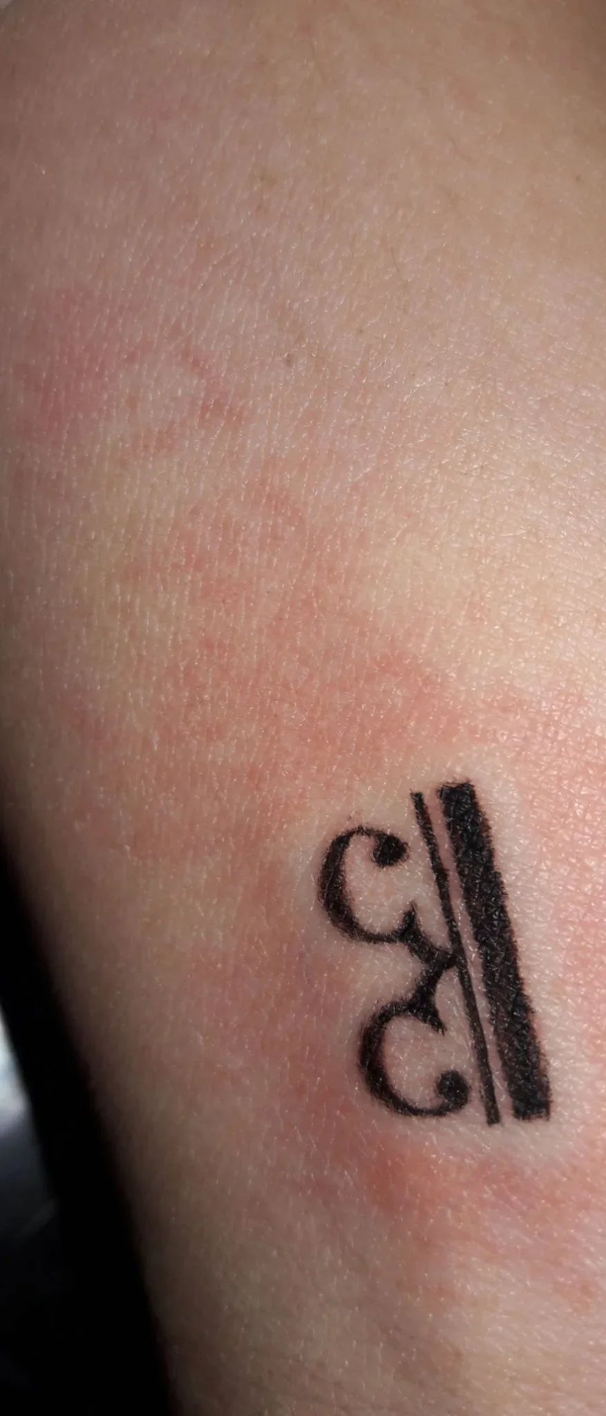 Symbolic tattoo by Fari Dane